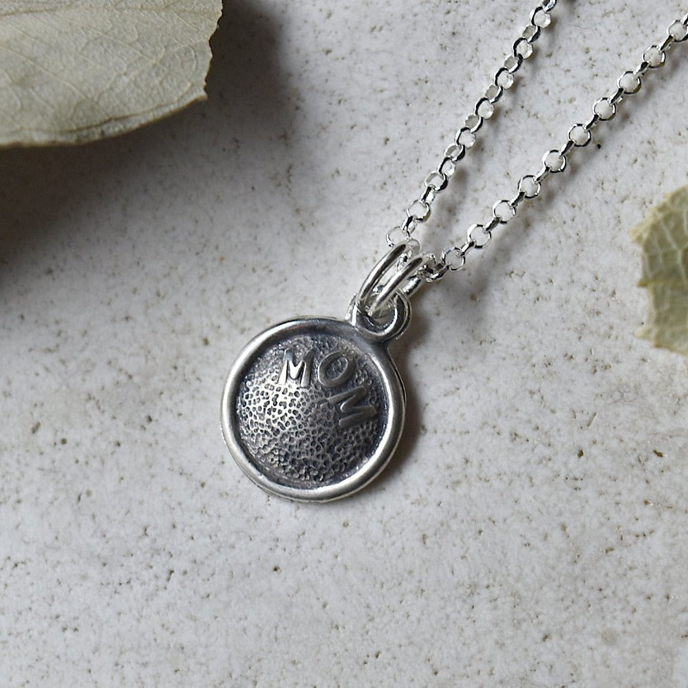 'Mom' Tiny Die Struck Silver Necklace | Magpie Jewellery