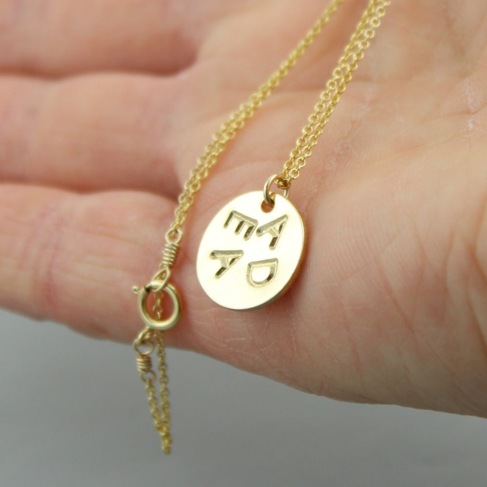 Monogram deals pendant gold