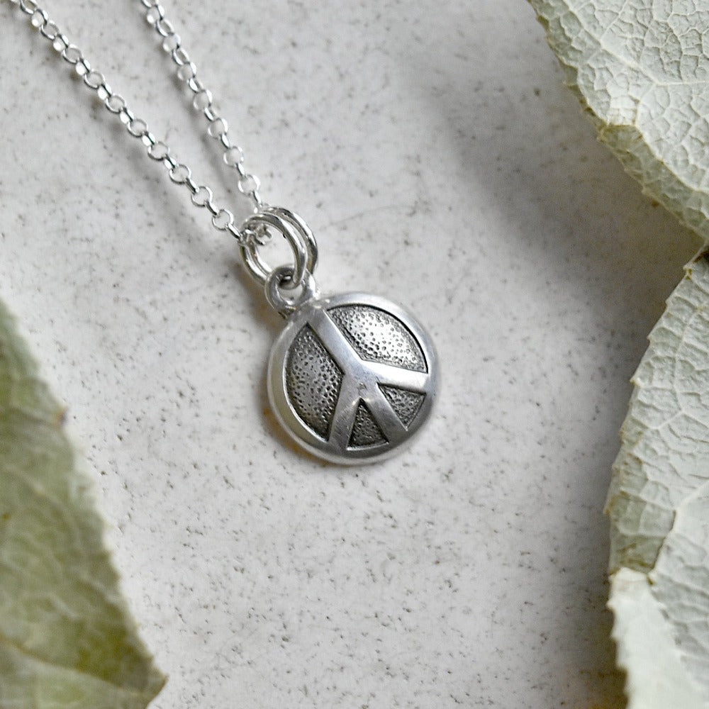 'Peace' Tiny Die Struck Silver Necklace - Magpie Jewellery