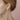 A pair of double pearl 14k Gold earrings featuring four lustrous pearls | on model