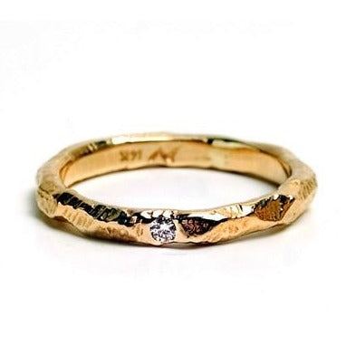 The Mountain Star ring by Anat Kaplan in 14kt yellow gold with .03ct diamond and hammered finish.