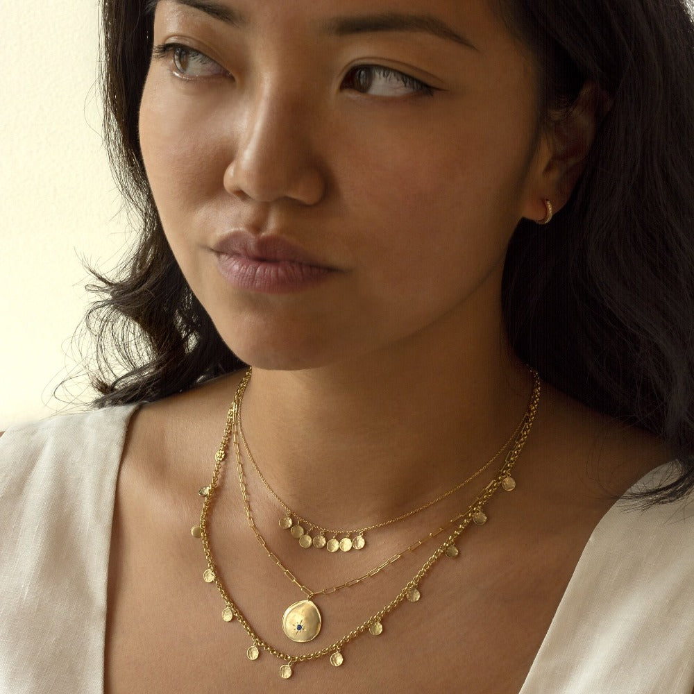 Gold disc hotsell station necklace