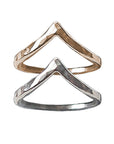 Two rings: hammered silver and gold-filled bands with pointed chevrons. 