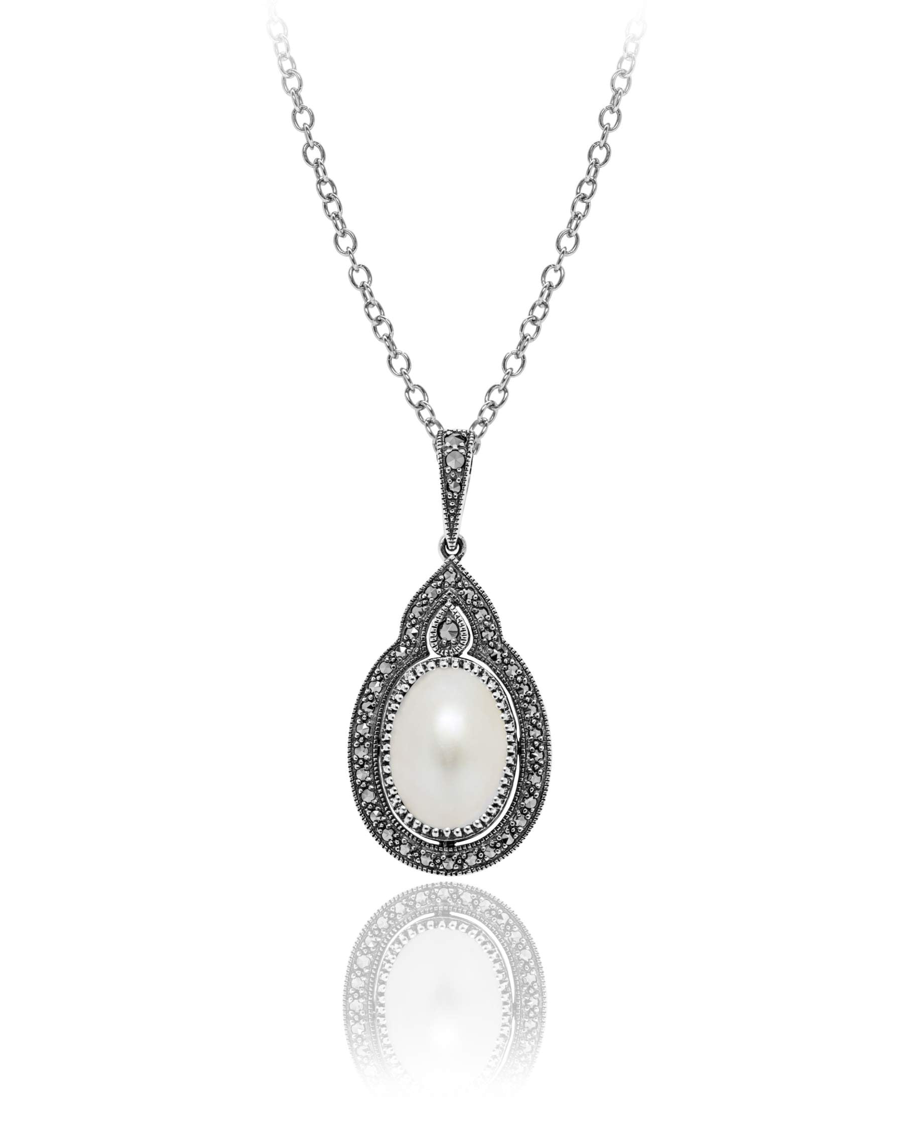 Oval Mabe Pearl Pendant with Prong Marcasite with an adjustable chain 16"-18" sterling silver oxidized.