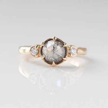 14k Yellow Gold Band featuring a natural rose cut salt & pepper diamond held securely in the middle with six prongs and accented by round brilliant cut diamonds