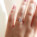 14k Rose Gold Solitaire Ring with a 1.38ct Round White Sapphire  | On hand model