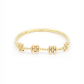 18k yellow gold ring featuring a beaded top shaped to be 4 mini flowers conected to a standard ring