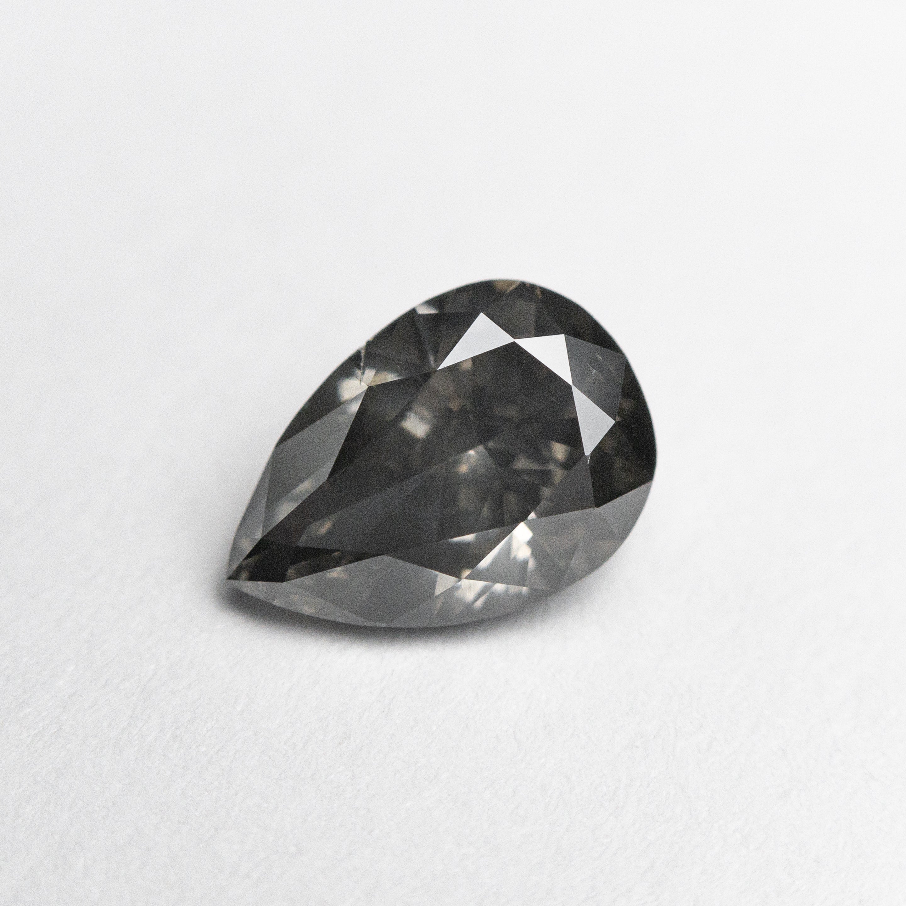 1.01ct 7.83x5.42x3.38mm Fancy Dark Grey Pear Brilliant 19913-01 – Magpie