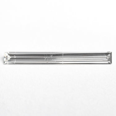 0.52ct 19.44x2.17x1.09mm SI2 E Baguette Step Cut 26545-01