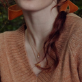 Gold Plated Silver Necklace with a White acorn Pendant | On Model