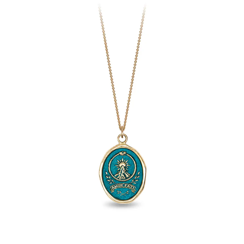 14k Yellow gold talisman Necklace with a bright Blue background depicting a Sun rising over a tall mountain peak, with the words "amor fati" written below