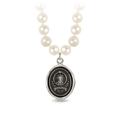 Ivory Freshwater Pearl Necklace with a Sterling Silver talisman depicting a Large mountain with a sun behind the peak, and the text "amor Fati" below it