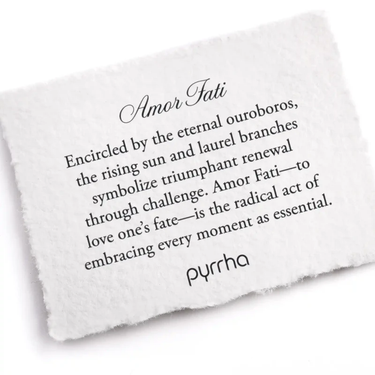 A Pyrrha note describing the Amor Fati talisman. It reads, "Encircled by the eternal ouroboros, the rising sun and laurel branches symbolize triumphant renewal through challenge. Amor Fati—to love one’s fate—is the radical act of embracing every moment as essential."