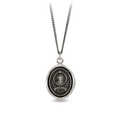 A Sterling Silver Pyrrha talisman With a Talisman depicting a tall mountain with a sun rising over it, including the text "Amor fati" written beneath it
