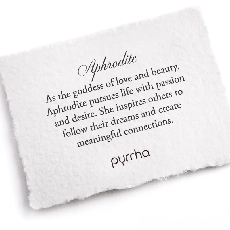 A Pyrrha note describing the Aphrodite Talisman. It reads, "As the goddess of love and beauty, Aphrodite pursues life with passion and desire. She inspires others to follow their dreams and create meaningful connections."