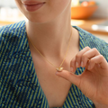 Gold Plated silver and silver Necklace with a gold and silver pendant in the shape of an apple pie