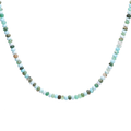 This Aqua necklace features Blue Peruvian Opal and Shiva Shell with a brass toggle clasp for convenient wear. 