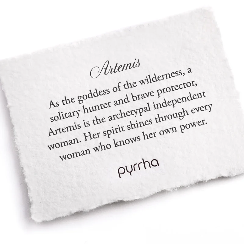 APyrrha Note describing the Artemis talisman. it reads, "As the goddess of the wilderness, a solitary hunter and brave protector, Artemis is the archetypal independent woman. Her spirit shines through every woman who knows her own power."