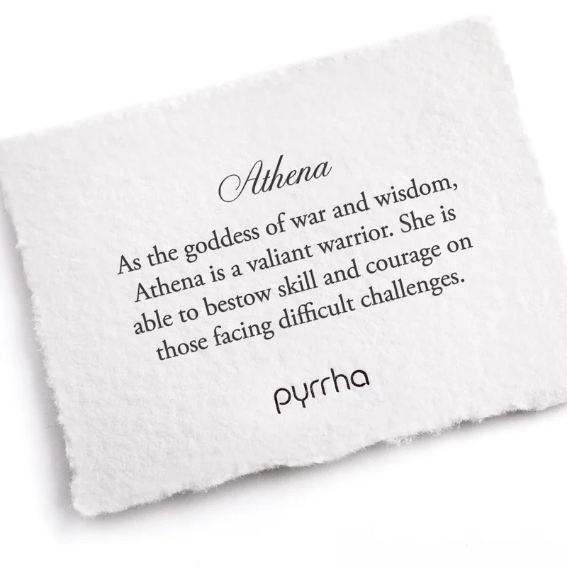 A Pyrrha note describing the Athena talisman. It reads, "As the goddess of war and wisdom, Athena is a valiant warrior. She is able to bestow skill and courage on those facing difficult challenges."