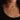 Sterling silver necklace featuring a ribbed circular pendant with a gemstone set at the center | on model