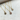 14k  Yellow gold necklace  featuring a ribbed pendant surrounding a beautiful gemstone 