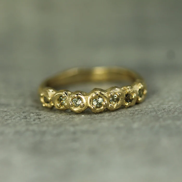 14k Yellow Gold Band with Tiny Sage green SApphires studded through out the top 