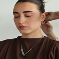 Short Gold earrings with delicate pewter nugget | On model