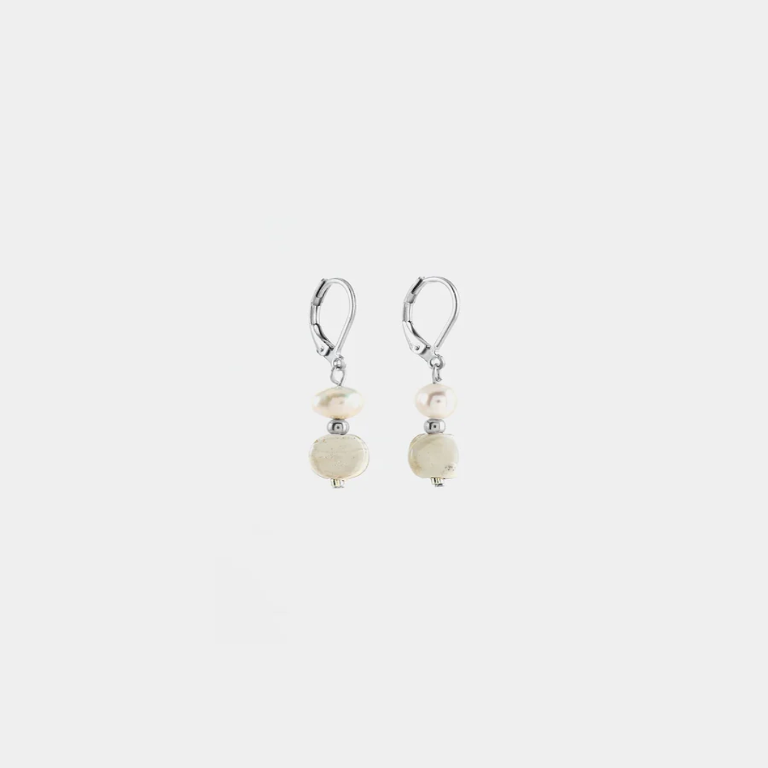 Delicate silver earrings with a freshwater pearl and a colorful white bead