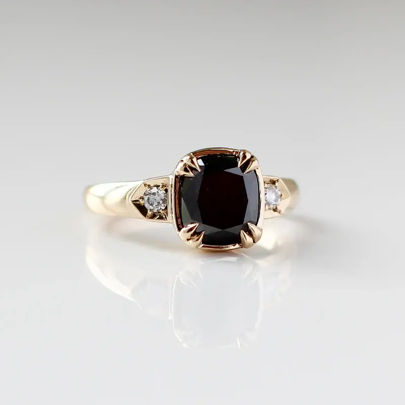 14k Yellow Gold Bezet Claw Set Ring featuring a 2.71ct cushion cut black diamond, with dia Accents 