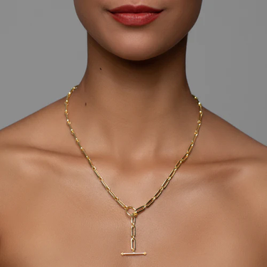 Gold Centre Front Toggle Necklace
including the added design feature ofthe centre front drop toggle | on model