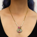 Plated Sterling Silver Necklace predominantly featuring many intricate beads shaped into an oval figure with a mosaic design with mainly green and red tones  | on model