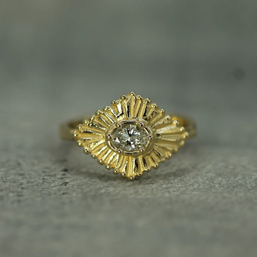 14k Yellow Gold Diamond-Shaped ring with a .25carat diamond in the center