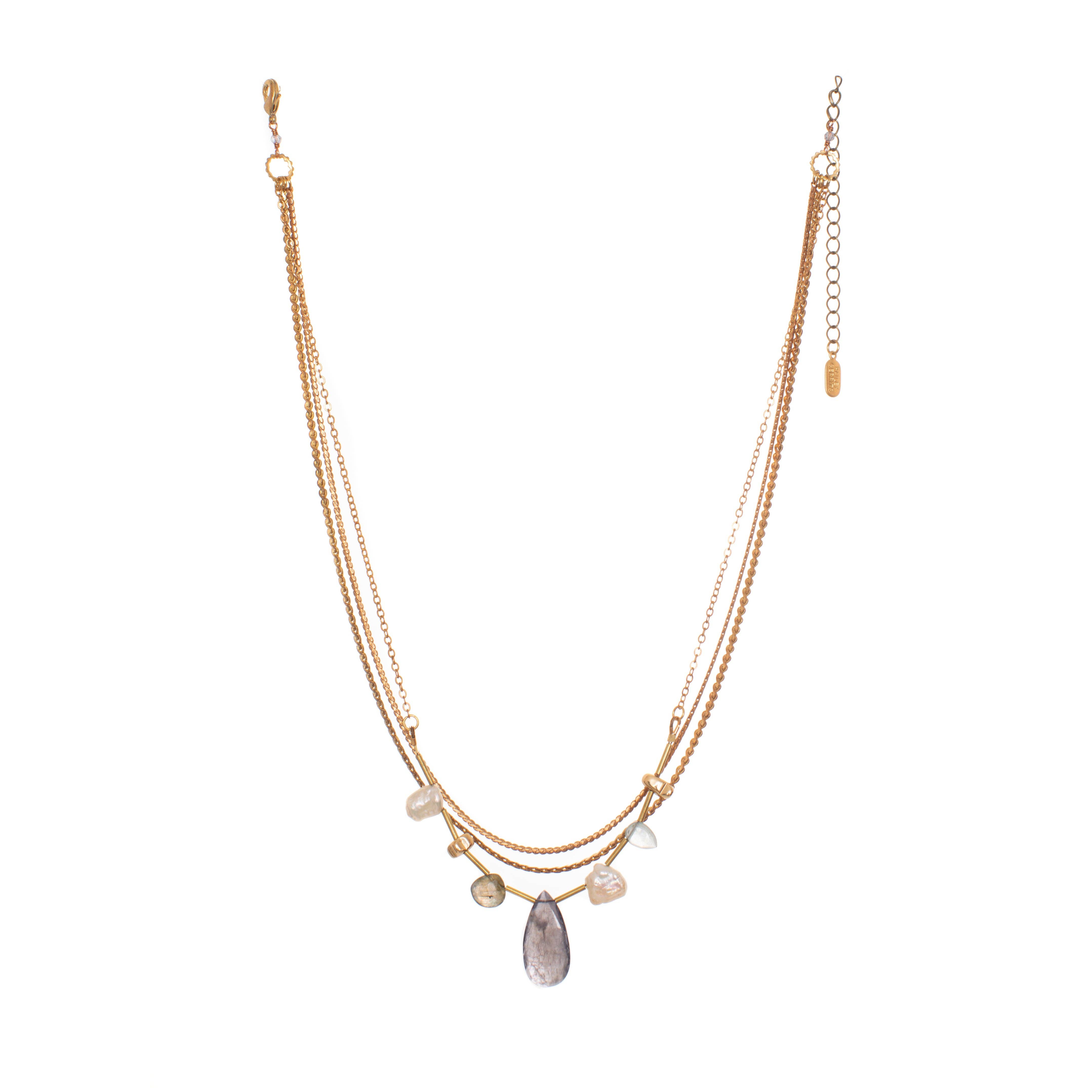 Seda Necklace featuring an asymmetrical assortment of gemstones and Freshwater Pearls in unique colours and textures combined with layers of reclaimed brass chains and gold-plated brass details. 