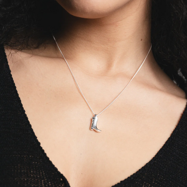 Sterling Silver cowboy boot pendant on a 18" Sterling Silver curb chain | on model