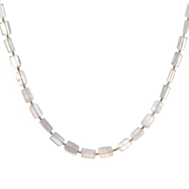 Cumulus necklace made in a graduated ombré style pattern, featuring hand-cut gemstones and Gold Hematite spacers