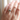 14k yellow Gold Curved contour band  set with a rose cut salt & pepper diamond | on model