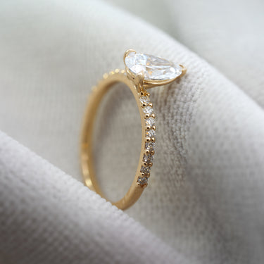 Pear Shaped Diamond Solitaire with Pave Shoulder