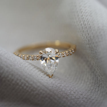 Pear Shaped Diamond Solitaire with Pave Shoulder