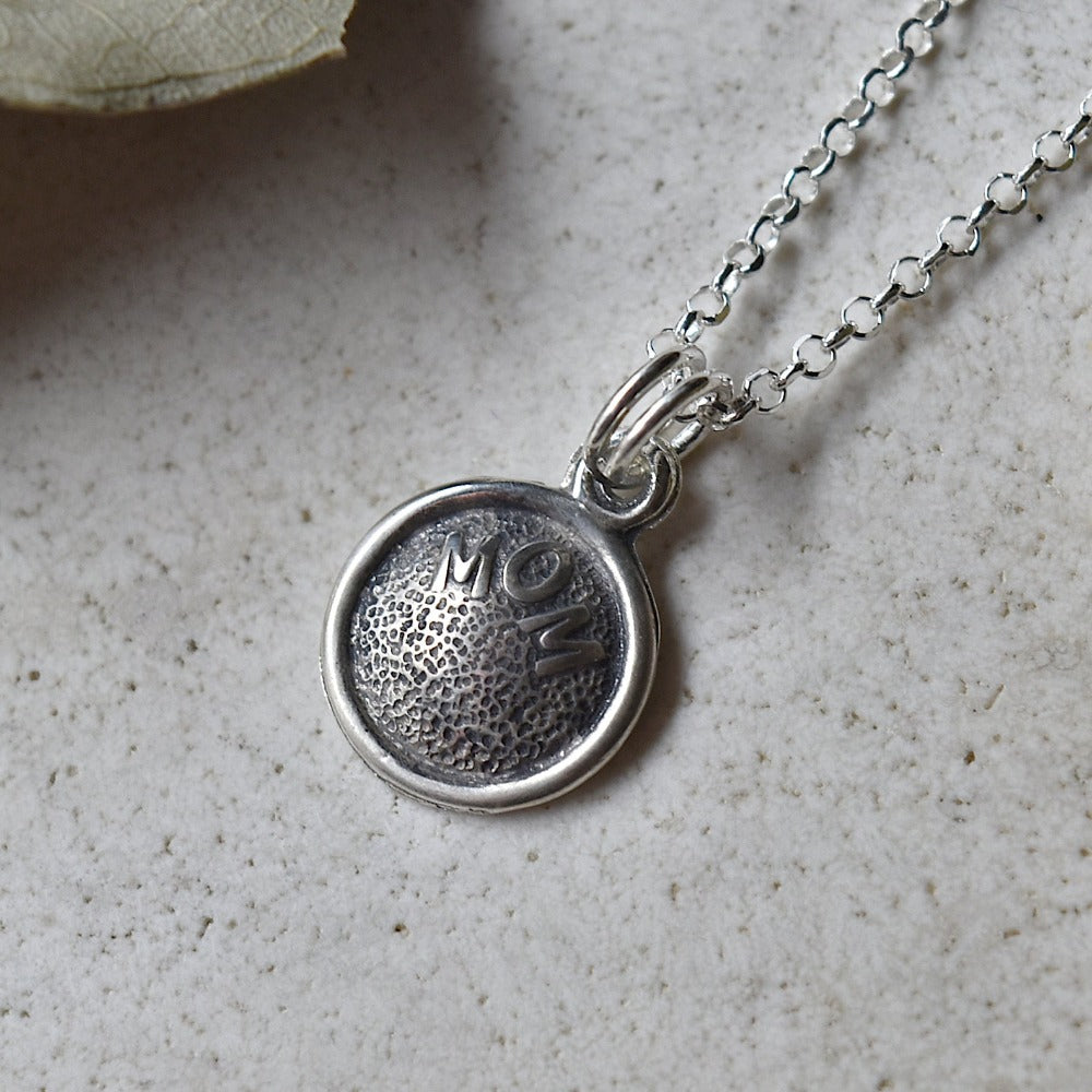 &#39;Mom&#39; Tiny Die Struck Silver Necklace | Magpie Jewellery