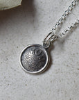 'Mom' Tiny Die Struck Silver Necklace | Magpie Jewellery