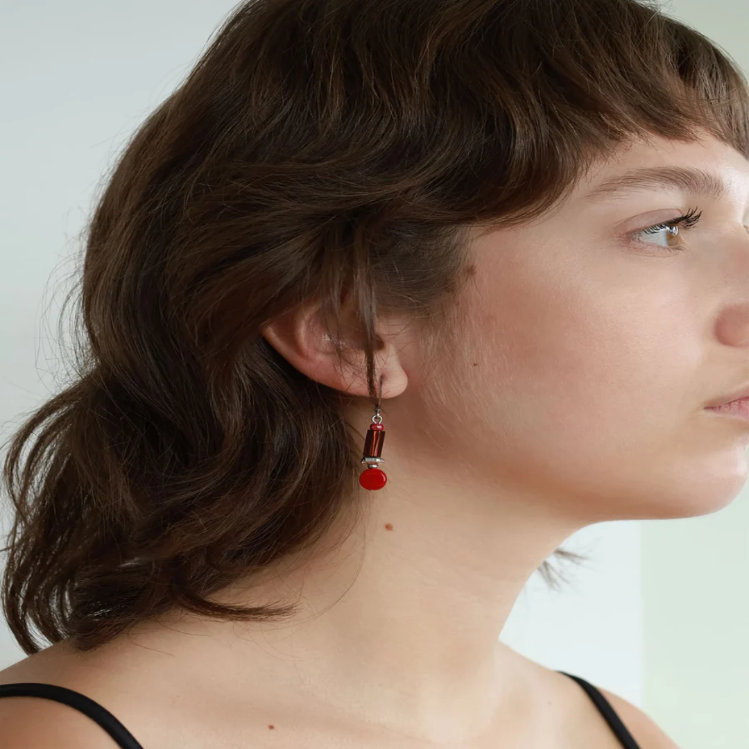 Short Silver earrings with colorful beads in varied shapes and a pewter nugget | on model