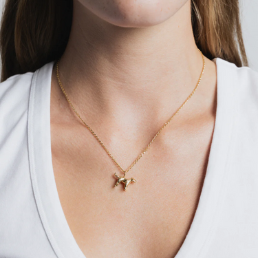 14k Gold plated brass dog pendant on a 18" 14k Gold vermeil elongated curb chain | on model