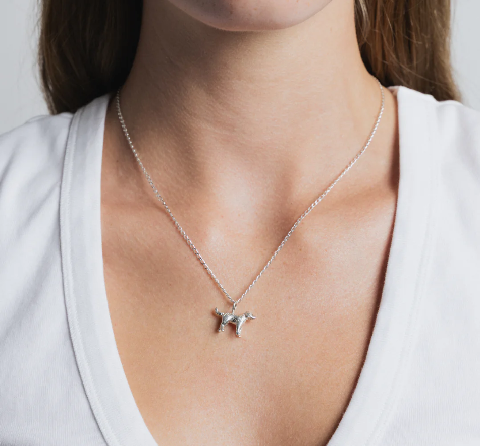 Sterling Silver dog pendant on a 18" Sterling Silver elongated curb chain | on model
