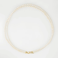 14k Yellow gold necklace featuring two strands of petite oval pearls, connected by a toggle clasp ( white pearls depicted in picture)
