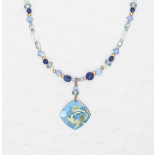 Niobium Beaded Necklace wiht blue and gold beads, featuring a floral pendant with blue flower and background accented with hints of green