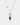 Two-tone pendant necklace with rectangular pewter piece, colorful black and orange glass beads and pearl