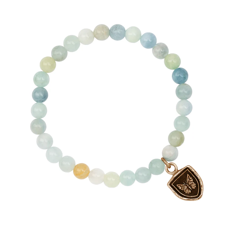 Sea toned Aquamarine Beaded bracelet with a Bronze Talisman Depicting A Butterfly