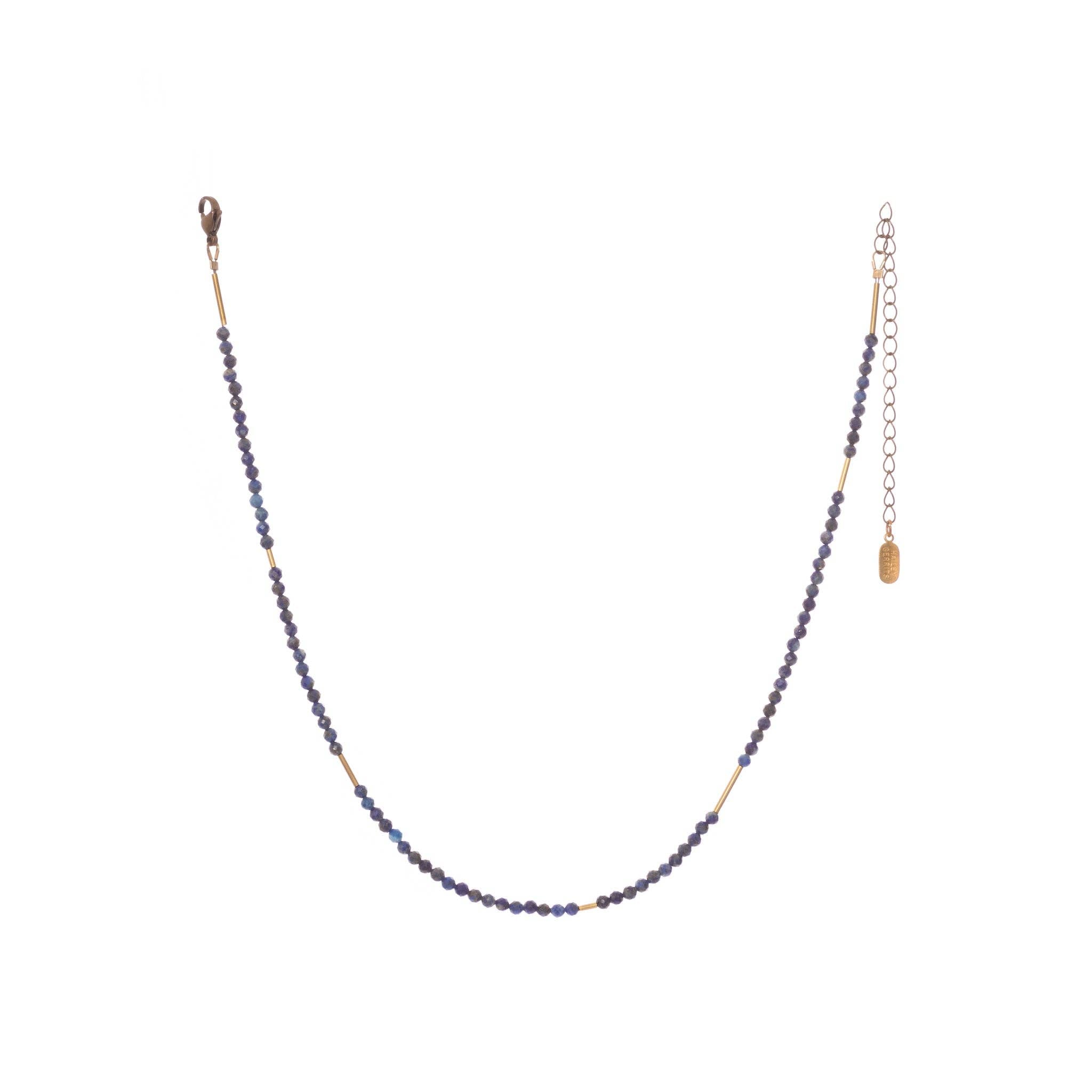 The Oso Necklace features hand-cut gemstones and recycled brass bars of varied lengths