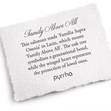 A Pyrrha Note that describes the Family above all talisman. It reads, "This talisman reads 'Familia Supra Omnia' in Latin, which means 'Family Above All'. The oak tree symbolizes a generational bond, while the winged heart represents the protection of loved ones."