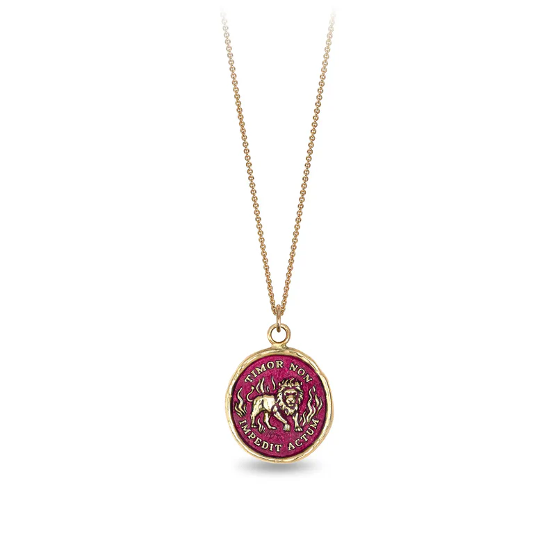 14k Yellow gold talisman necklace with a bright Red background depicting a lion standing in flames with the words "Timor Non Impedit Actum" written around the lion